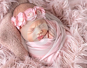 Cute sleepy newborn baby