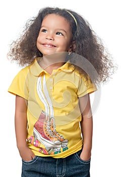 Cute small afroamerican girl standing with a smile