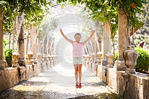 Cute small girl in Alfabia gardens photo