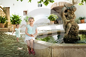 Cute small girl in Alfabia gardens photo