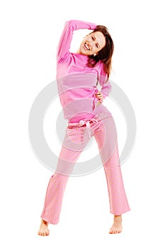 Cute smiley woman in pink pyjamas