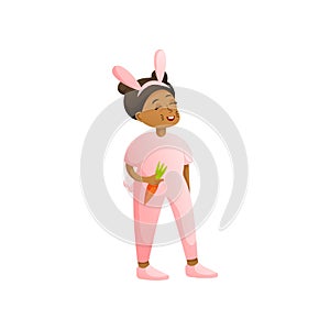 Cute smiling african kid girl in pink rabbit costume