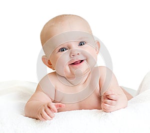 Cute smiling baby kid lying