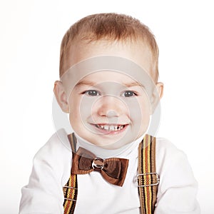 Cute smiling boy with bow-tie