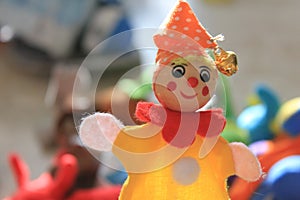 A cute smiling clown doll