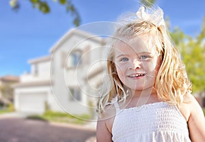 Cute Smiling Girl Playing in Front Yard