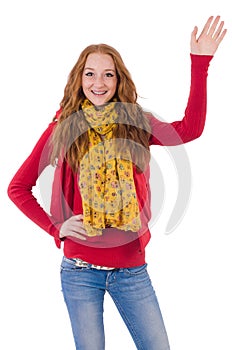 Cute smiling girl in red jacket and jeans isolated