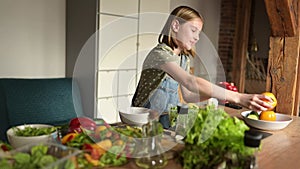 Cute Smiling A Little Girl Cooking A Fresh Healthy Vegetable Food
