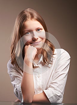 Cute smiling teen schoolgirl