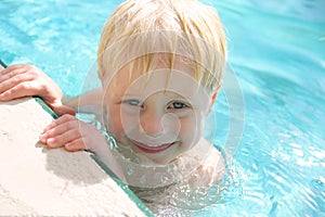 Cute Smiling Toddler in Swimming Pool