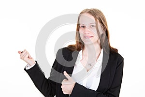 Cute smiling young woman blonde standing with thumbs up in businesswoman clothes