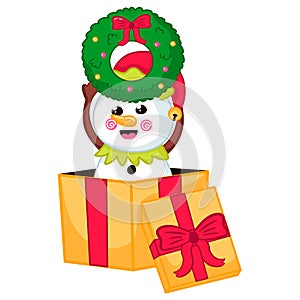 Cute snowman character in elf costume holding christmas wreath sitting in gift box in cartoon style