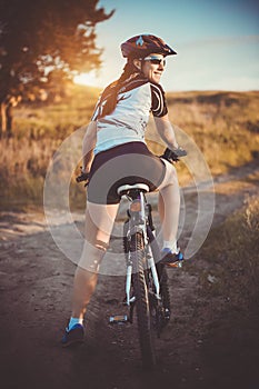 Cute sportswoman on bicycle. Active Leisure