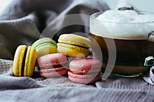 Cute still life with coffee and macaroons.