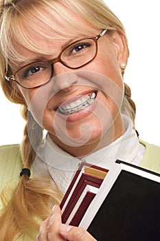 Cute Student with Braces Carrying Her Books