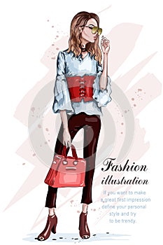 Cute stylish girl in fashion clothes. Fashion woman with bag. Hand drawn brunette woman. Sketch. photo
