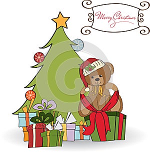 Cute teddy bear with a big Christmas gift photo