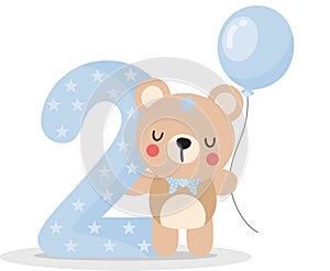Cute teddy bear boy with balloon to celebrate happy 2st year or 2st month photo