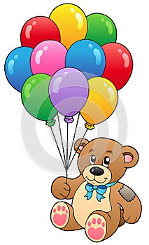 Cute teddy bear holding balloons