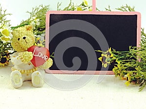 Cute teddy bear and red heart valentine`s day