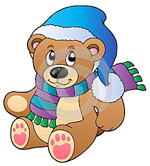 Cute teddy bear in winter clothes