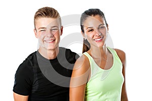 Cute teen couple in sportswear.