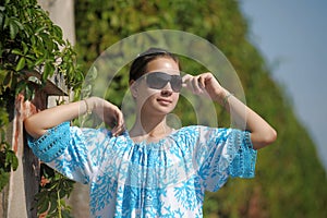 Cute teen girl in blue dress. Freedom