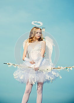 Cute teen girl. Love card. Arrow of love. Cupid in valentine day. Pretty white little girl as the cupid with a bow and