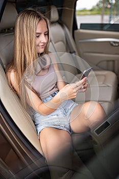 Cute teenage girl listening to her favorite music