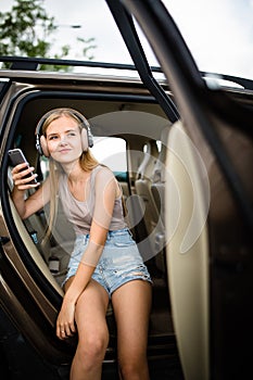 Cute teenage girl listening to her favorite music