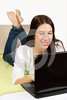 Cute teenage girl, surfing the internet