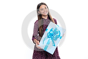 Cute teenager child girl congratulate with valentines day, giving romantic gift box. Present, greeting and gifting