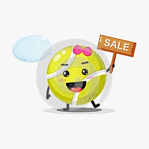 Cute tennis ball mascot with the sales sign