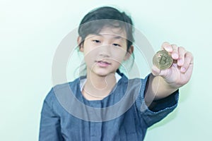 cute Thai girl happily with Cryptocurrency