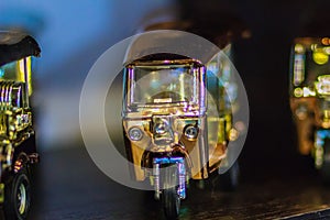 Cute Thai traditional taxi tuk-tuk metal model, souvenir from Th