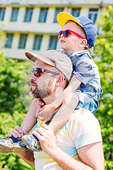 Cute toddler boy and his dad