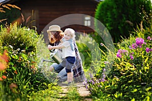 Cute toddler boy and his mat summer sunny day