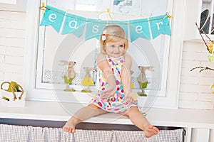 Cute toddler girl with easter decoration