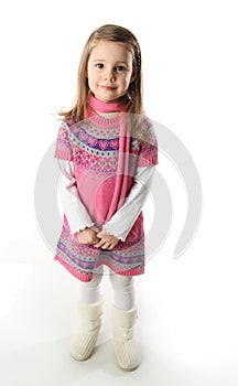 Cute toddler girl wearing a scarf and dress