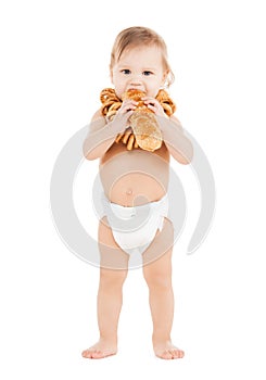 Cute todler eating long bread