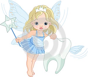 Cute Tooth Fairy flying with Tooth photo