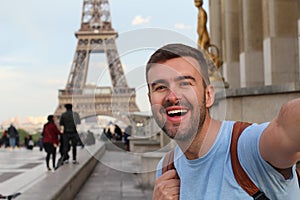 Cute tourist taking a selfie in France