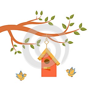 Cute tree branch with green leaves, colorful birdhouse and two yellow-blue birds