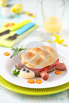 Cute turtle shape hamburger with a meat burger, cheese and sausages for kids photo