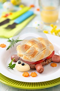 Cute turtle shape hamburger with a meat burger, cheese and sausages for kids photo