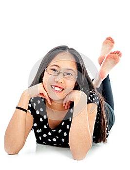 Cute Tween Lying on Floor in Casual Pose