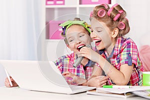 Cute tweenie girls with laptop