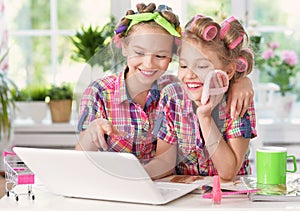 Cute tweenie girls with laptop