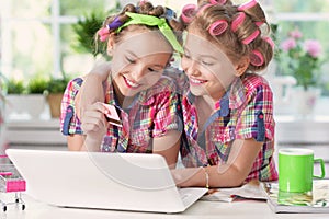 Cute tweenie girls with laptop