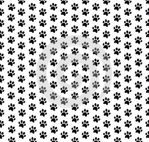 Cute wallpaper with black seamless pattern of animal footprints